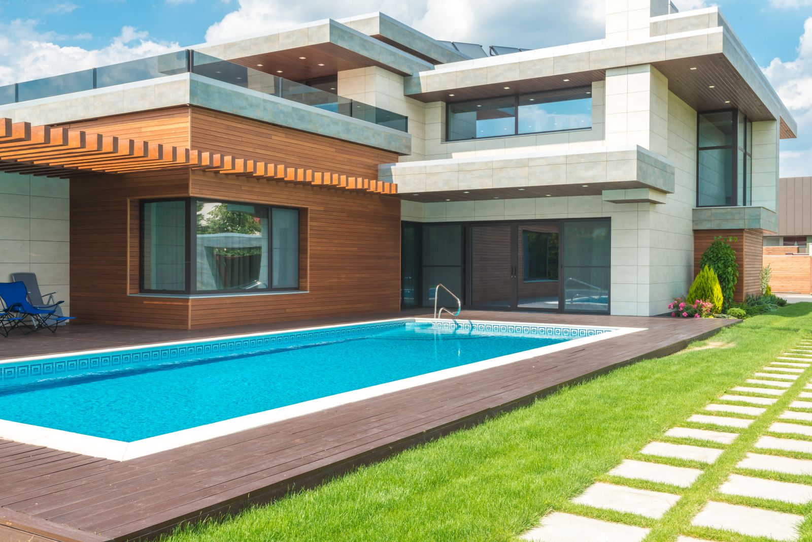 Twilight Pool with Water Features – [City]